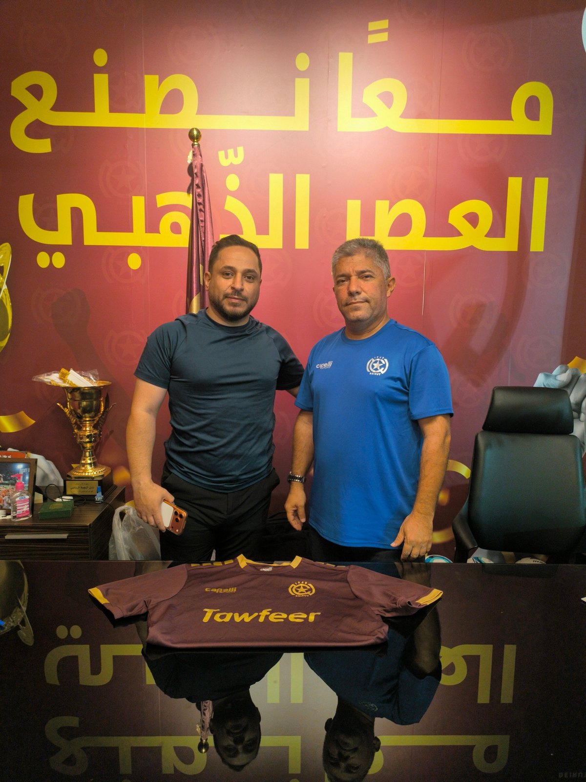 Signing the partnership at the club